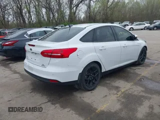 2016 Ford Focus SE with VIN 1FADP3F26GL262689, listed as a IAAI auction lot 41917883 with 178,371 mi miles. Bid and sale history available at carsss.com. Image 4.