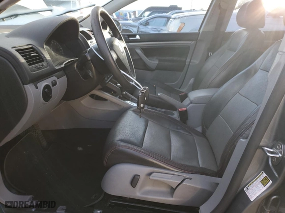 2007 Volkswagen Rabbit with VIN WVWDR91K27W087113, listed as a Copart auction lot 77580554 with 124,281 mi miles and Salvage Title. Bid and sale history available at carsss.com. Image 7.