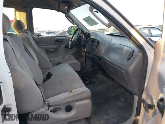 2004 Ford F-150 XL with VIN 2FTRX17W84CA43289, listed as a IAAI auction lot 41248462 with Not provided miles and . Bid and sale history available at DreamBid. Image 5.