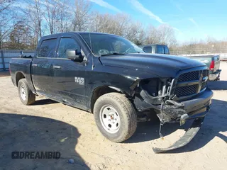 2020 Ram 1500 Tradesman with VIN 3C6RR7KG8LG162059, listed as a IAAI auction lot 41600836 with 70,507 mi miles and . Bid and sale history available at DreamBid. Image 1.