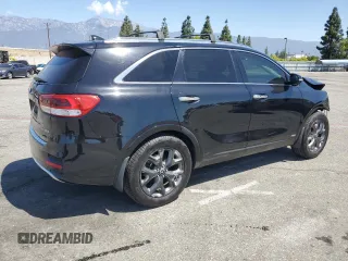 2016 Kia Sorento SXL z VIN 5XYPKDA19GG016449, wystawiony jako Copart lot #56943845 z przebiegiem 72 350 mil mil oraz Szkoda całkowita • Salvage title. Historia ofert i sprzedaży dostępna na DreamBid. Obrazek 3.