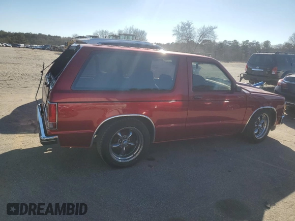 1990 Chevrolet Blazer z VIN 1GNCS18Z2L8113073, wystawiony jako Copart lot #87676865 z przebiegiem 22 827 mil mil oraz Szkoda całkowita • Salvage title. Historia ofert i sprzedaży dostępna na DreamBid. Obrazek 3.