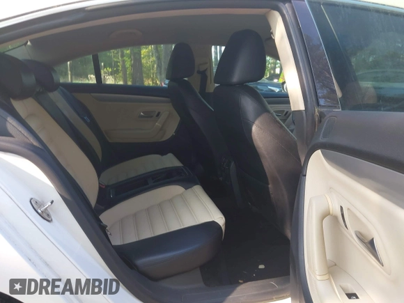 2012 Volkswagen CC Sport PZEV with VIN WVWMP7AN5CE543495, listed as a IAAI auction lot 42150948 with 100,984 mi miles. Bid and sale history available at carsss.com. Image 8.