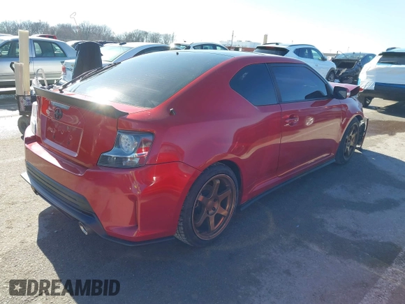 2016 Scion tC with VIN JTKJF5C77GJ026150, listed as a IAAI auction lot 41424088 with 96,370 mi miles. Bid and sale history available at carsss.com. Image 4.