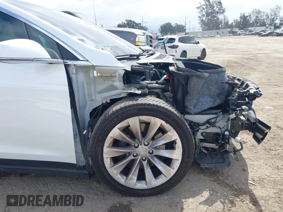 2020 Tesla Model X Long Range with VIN 5YJXCDE26LF238982, listed as a IAAI auction lot 42100220 with 44,804 mi miles. Bid and sale history available at carsss.com. Image 21.