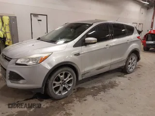 2013 Ford Escape SEL with VIN 1FMCU0H98DUC72150, listed as a IAAI auction lot 41213748 with 136,323 mi miles. Bid and sale history available at carsss.com. Image 16.