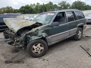 1995 Jeep Grand Cherokee Laredo with VIN 1J4FX58S0SC726476, listed as a Copart auction lot 69608784 with 264,705 mi miles and Salvage Title. Bid and sale history available at carsss.com. Image 1.