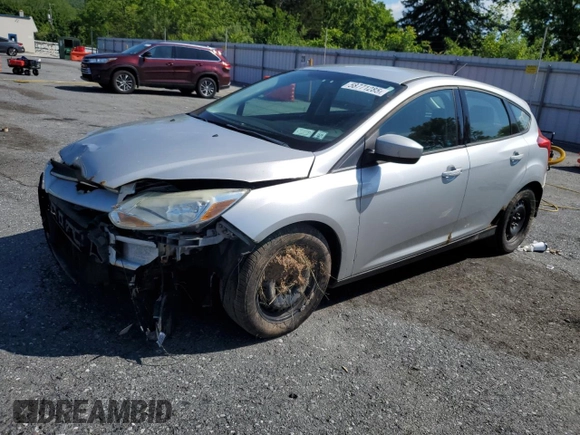 2012 Ford Focus SE z VIN 1FAHP3K20CL219046, wystawiony jako Copart lot #58771285 z przebiegiem 167 703 mil mil oraz Szkoda całkowita • Salvage title. Historia ofert i sprzedaży dostępna na DreamBid. Obrazek 1.