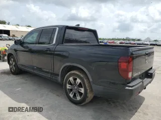 2017 Honda Ridgeline RTL with VIN 5FPYK2F51HB001058, listed as a Copart auction lot 55753865 with 113,539 mi miles and Clean title. Bid and sale history available at DreamBid. Image 2.