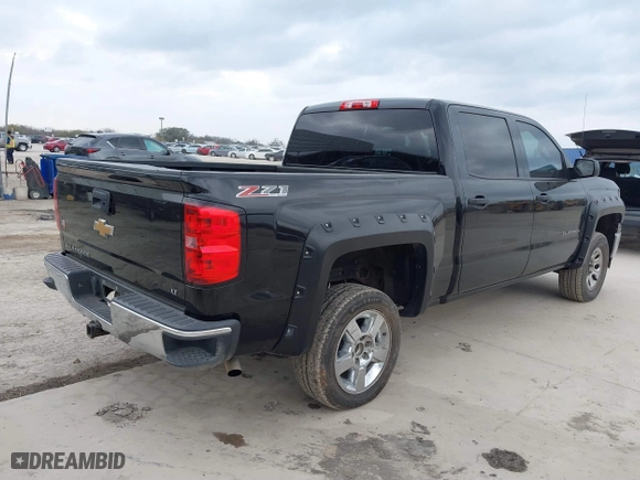 2014 Chevrolet Silverado 1500 LT with VIN 3GCUKREC5EG493728, listed as a IAAI auction lot 41710490 with 243,509 mi miles. Bid and sale history available at carsss.com. Image 4.