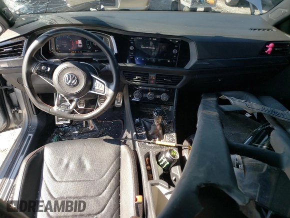 2020 Volkswagen Jetta GLI S z VIN 3VW5T7BUXLM010832, wystawiony jako Copart lot #66376523 z przebiegiem 66 434 mil mil oraz . Historia ofert i sprzedaży dostępna na DreamBid. Obrazek 8.