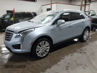 2017 Cadillac XT5 Premium Luxury AWD z VIN 1GYKNERS4HZ306955, wystawiony jako IAAI lot #41932934 z przebiegiem 150 050 mil mil oraz . Historia ofert i sprzedaży dostępna na DreamBid. Obrazek 17.