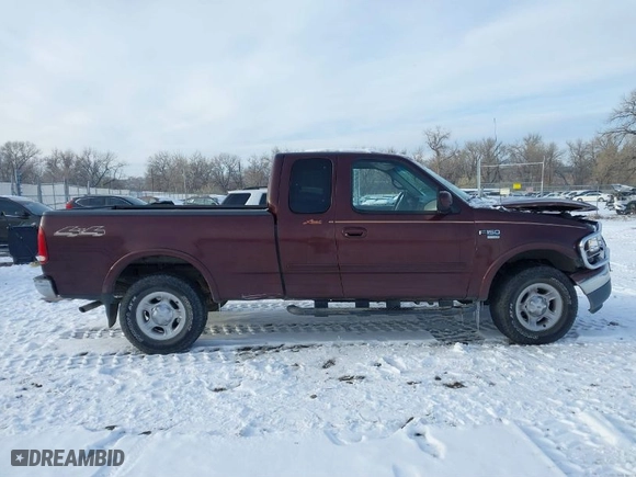 2000 Ford F-150 XL with VIN 1FTRX18L2YNA50128, listed as a IAAI auction lot 40956879 with 1 mi miles. Bid and sale history available at carsss.com. Image 12.