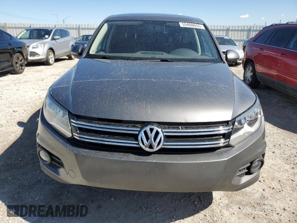 2012 Volkswagen Tiguan SE z VIN WVGAV7AX2CW004364, wystawiony jako Copart lot #55408655 z przebiegiem 271 198 mil mil oraz Szkoda całkowita • Salvage title. Historia ofert i sprzedaży dostępna na DreamBid. Obrazek 5.