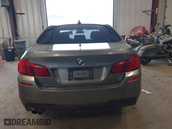 2014 BMW 5 Series 528i xDrive with VIN WBA5A7C5XED613856, listed as a IAAI auction lot 42018901 with 121,783 mi miles and . Bid and sale history available at DreamBid. Image 16.