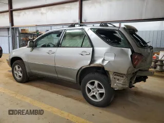 1999 Lexus RX 300 Luxury SUV with VIN JT6GF10U1X0039266, listed as a Copart auction lot 43052215 with 219,730 mi miles and Salvage Title. Bid and sale history available at carsss.com. Image 2.