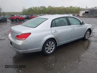 2007 Toyota Avalon XL with VIN 4T1BK36B47U208796, listed as a IAAI auction lot 42008744 with 250,000 mi miles. Bid and sale history available at carsss.com. Image 4.
