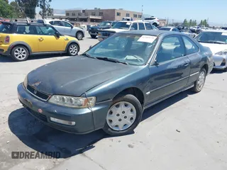1996 Honda Accord LX with VIN 1HGCD7233TA023922, listed as a IAAI auction lot 42203135 with 239,677 mi miles and . Bid and sale history available at carsss.com. Image 6.