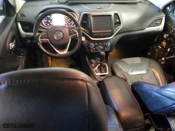 2015 Jeep Cherokee Trailhawk with VIN 1C4PJMBBXFW727850, listed as a Copart auction lot 88881955 with 184,718 mi miles and Salvage Title. Bid and sale history available at carsss.com. Image 8.