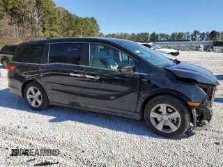 2019 Honda Odyssey EX-L with VIN 5FNRL6H70KB085719, listed as a Copart auction lot 48963065 with 148,694 mi miles and Salvage Title. Bid and sale history available at carsss.com. Image 4.