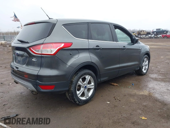 2015 Ford Escape SE with VIN 1FMCU9G96FUB90684, listed as a IAAI auction lot 41832982 with 127,900 mi miles. Bid and sale history available at carsss.com. Image 4.