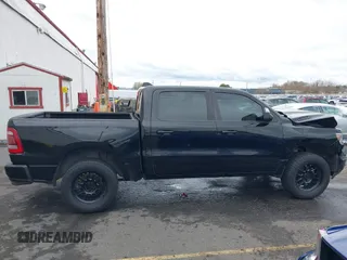 2019 Ram 1500 Big Horn/Lone Star with VIN 1C6SRFFT9KN625013, listed as a IAAI auction lot 41611276 with 100,463 mi miles. Bid and sale history available at carsss.com. Image 14.