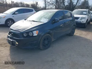 2014 Chevrolet Sonic LT with VIN 1G1JC6SG6E4121407, listed as a IAAI auction lot 41671918 with 137,517 mi miles. Bid and sale history available at carsss.com. Image 2.