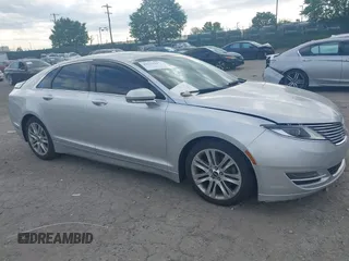 2014 Lincoln MKZ z VIN 3LN6L2GK5ER823529, wystawiony jako IAAI lot #42221147 z przebiegiem 151 751 mil mil oraz . Historia ofert i sprzedaży dostępna na DreamBid. Obrazek 1.