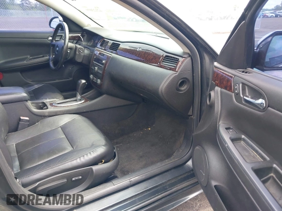 2013 Chevrolet Impala LTZ with VIN 2G1WC5E36D1187393, listed as a IAAI auction lot 42123859 with 176,539 mi miles and . Bid and sale history available at DreamBid. Image 5.