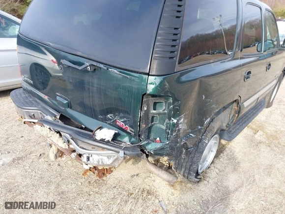 2004 GMC Yukon SLT with VIN 1GKEK13T64J154244, listed as a IAAI auction lot 41709775 with 175,009 mi miles. Bid and sale history available at carsss.com. Image 6.