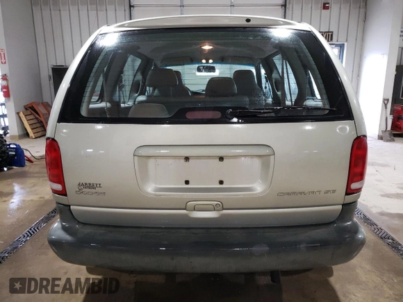 2000 Dodge Caravan SE with VIN 2B4GP45G7YR822770, listed as a Copart auction lot 86096444 with 128,592 mi miles and Salvage Title. Bid and sale history available at carsss.com. Image 6.