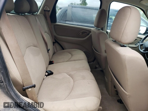 2005 Mazda Tribute S with VIN 4F2YZ04195KM65089, listed as a Copart auction lot 70993244 with Not Provided miles and Salvage Title. Bid and sale history available at DreamBid. Image 11.