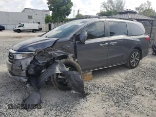 2022 Honda Odyssey Touring z VIN 5FNRL6H80NB018308, wystawiony jako Copart lot #62931325 z przebiegiem 39 416 mil mil oraz Szkoda całkowita • Salvage title. Historia ofert i sprzedaży dostępna na DreamBid. Obrazek 1.