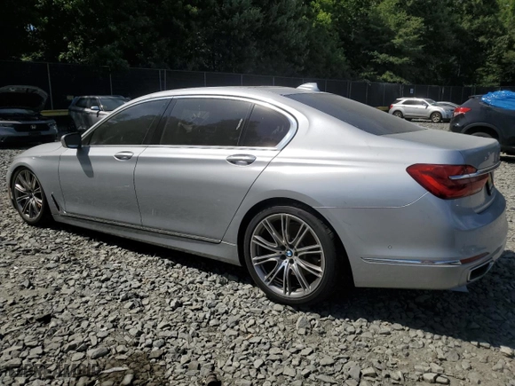 2016 BMW 7 Series 740i with VIN WBA7E2C56GG738760, listed as a Copart auction lot 59668504 with 81,484 mi miles and Salvage Title. Bid and sale history available at carsss.com. Image 2.