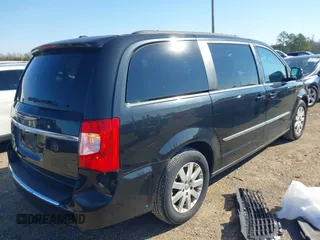 2015 Chrysler Town & Country Touring with VIN 2C4RC1BG9FR626501, listed as a IAAI auction lot 41279210 with 211,206 mi miles and . Bid and sale history available at DreamBid. Image 4.