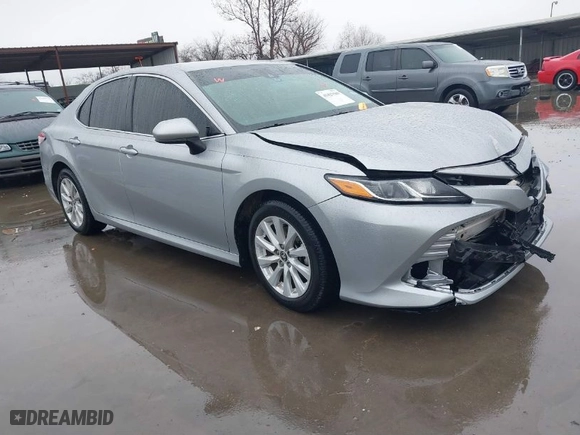 2020 Toyota Camry LE with VIN 4T1C11AK1LU382855, listed as a IAAI auction lot 41427509 with 118,594 mi miles. Bid and sale history available at carsss.com. Image 1.