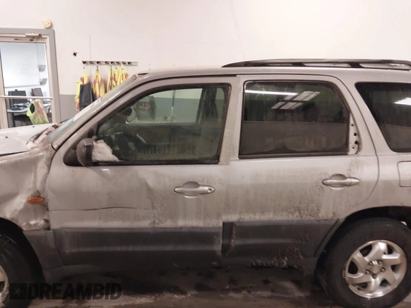 2003 Mazda Tribute DX with VIN 4F2YZ02B73KM43813, listed as a IAAI auction lot 41575708 with 202,214 mi miles and . Bid and sale history available at carsss.com. Image 14.