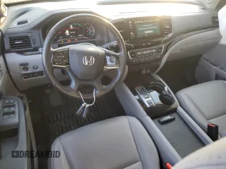 2020 Honda Pilot Touring 8-Passenger with VIN 5FNYF6H96LB029385, listed as a Copart auction lot 87391534 with 68,201 mi miles and Salvage Title. Bid and sale history available at DreamBid. Image 8.