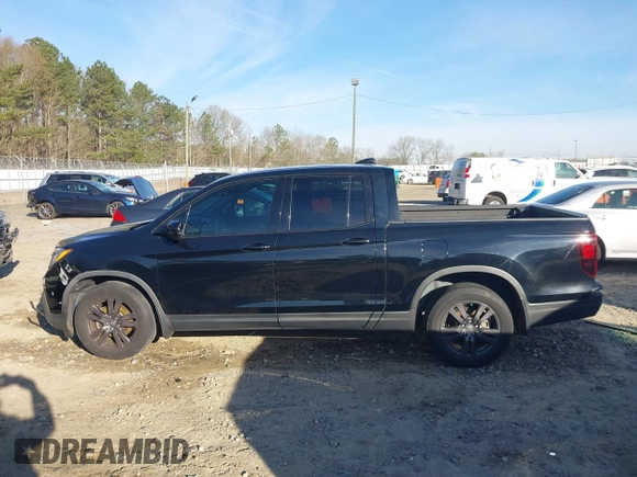 2019 Honda Ridgeline Sport with VIN 5FPYK2F12KB007990, listed as a IAAI auction lot 41828709 with 67,736 mi miles and . Bid and sale history available at DreamBid. Image 14.