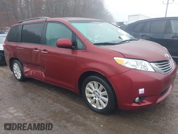 2015 Toyota Sienna Ltd with VIN 5TDDK3DC5FS106080, listed as a IAAI auction lot 41579010 with 133,495 mi miles. Bid and sale history available at carsss.com. Image 1.