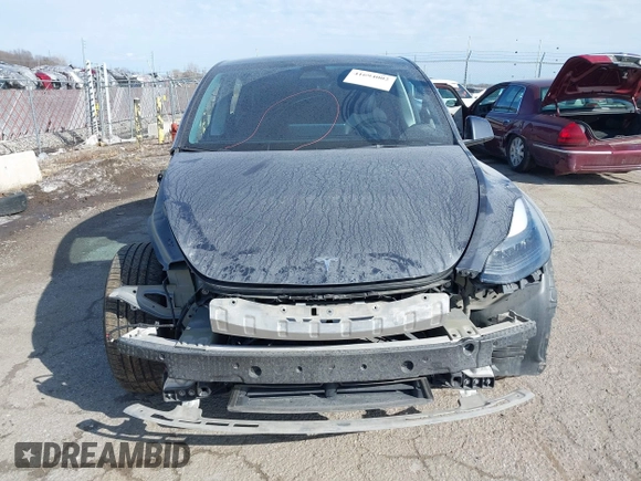 2023 Tesla Model Y Performance with VIN 7SAYGDEF7PF590750, listed as a IAAI auction lot 41694002 with Not Provided miles and . Bid and sale history available at DreamBid. Image 12.