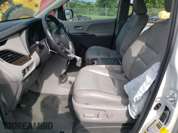 2017 Toyota Sienna XLE with VIN 5TDDZ3DC0HS169103, listed as a Copart auction lot 63275325 with 311,578 mi miles and Salvage title. Bid and sale history available at DreamBid. Image 7.