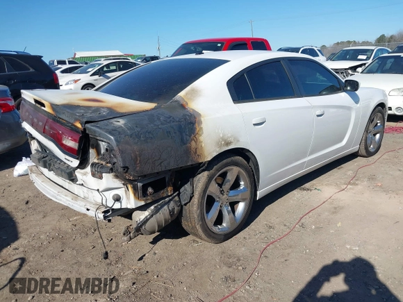 2014 Dodge Charger SXT with VIN 2C3CDXHG8EH117439, listed as a IAAI auction lot 41458304 with 189,041 mi miles and . Bid and sale history available at DreamBid. Image 4.