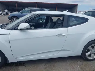 2012 Hyundai Veloster w/Gray Int с VIN KMHTC6AD6CU026944, выставлен на аукционе IAAI как лот 42216988 с пробегом 61 147 миль миль и . История ставок и продаж доступна на DreamBid. Изображение 14.