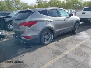2017 Hyundai Santa Fe 2.4L with VIN 5XYZTDLB9HG440064, listed as a IAAI auction lot 42061524 with 140,365 mi miles and . Bid and sale history available at DreamBid. Image 4.