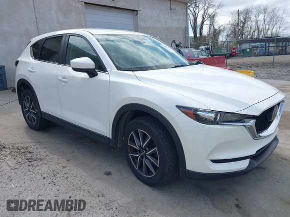 2018 Mazda CX-5 Touring with VIN JM3KFBCMXJ0353369, listed as a IAAI auction lot 41902554 with 154,104 mi miles and . Bid and sale history available at DreamBid. Image 1.