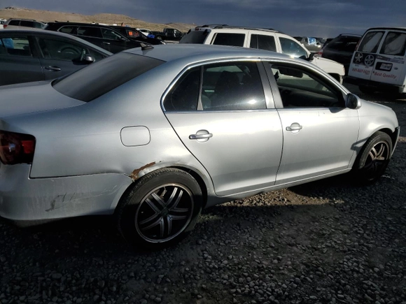 2009 Volkswagen Jetta SE с VIN 3VWRM71K99M061312, выставлен на аукционе Copart как лот 42747695 с пробегом 189 183 миль миль и Списание • Salvage title. История ставок и продаж доступна на DreamBid. Изображение 3.