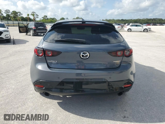 2021 Mazda 3 Premium Plus with VIN JM1BPBNYXM1403126, listed as a Copart auction lot 59971535 with 56,952 mi miles and Salvage title. Bid and sale history available at DreamBid. Image 6.