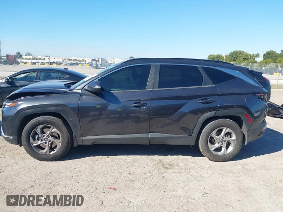 2022 Hyundai Tucson SEL with VIN 5NMJB3AE7NH065963, listed as a IAAI auction lot 41673572 with 55,404 mi miles. Bid and sale history available at carsss.com. Image 15.