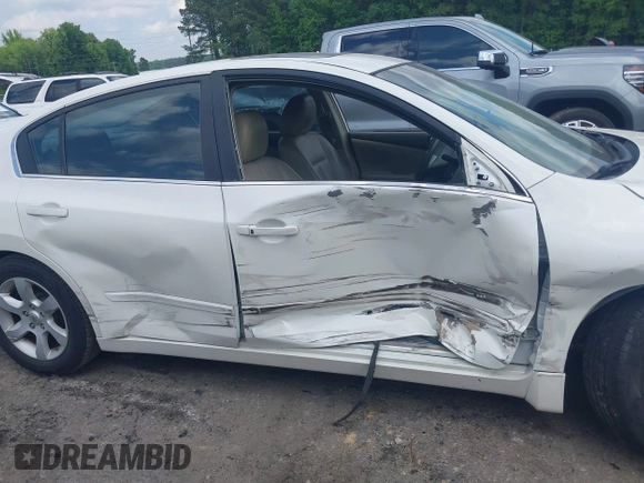 2009 Nissan Altima S z VIN 1N4AL21E39N471549, wystawiony jako IAAI lot #42203365 z przebiegiem 197 775 mil mil oraz . Historia ofert i sprzedaży dostępna na DreamBid. Obrazek 13.